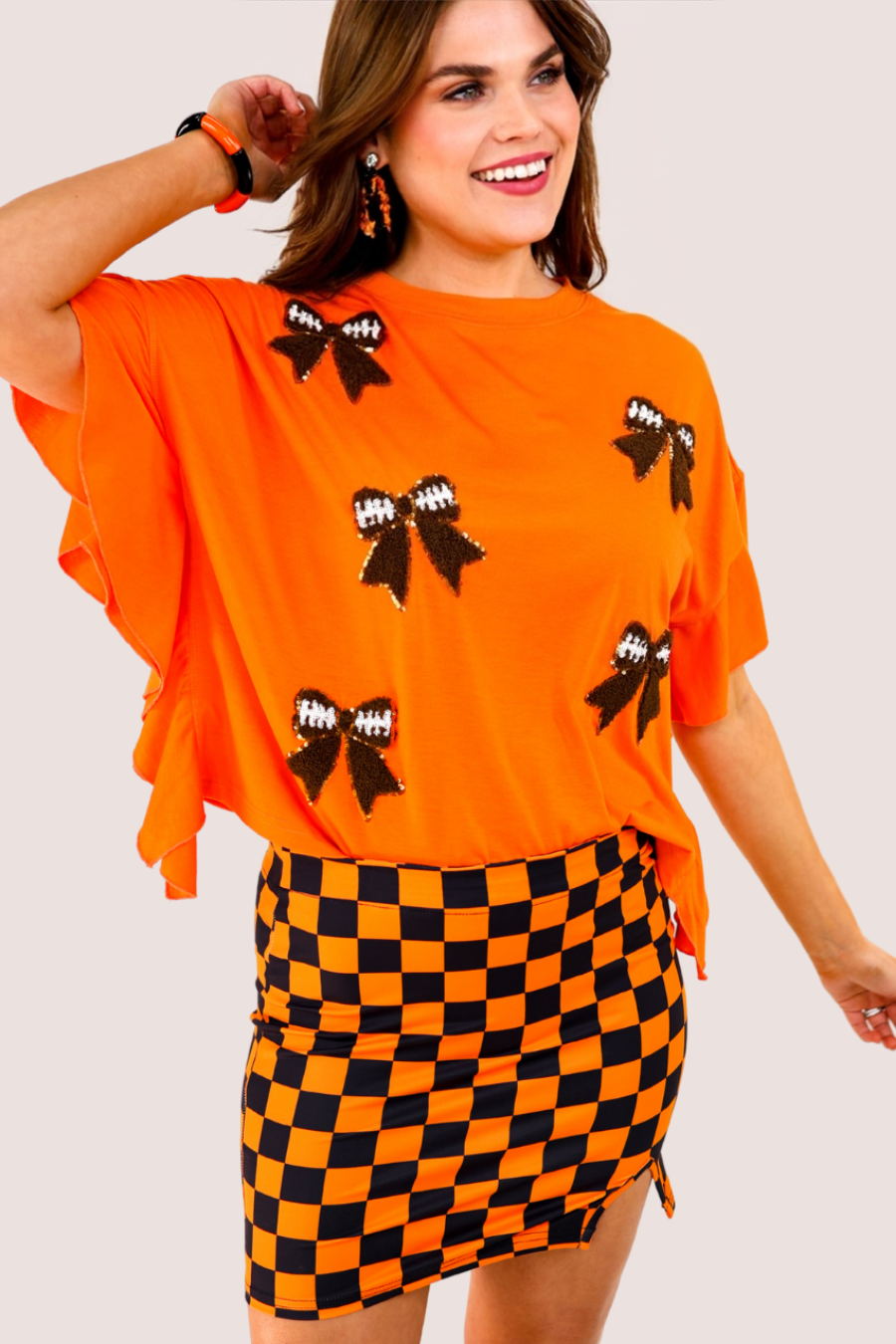 Sideline Sparkle Ruffle Top- Orange - Jess Lea Boutique