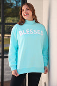 Light blue oversized blessed mock neck pullover sweatshirt with white blessed print fits size comfortably