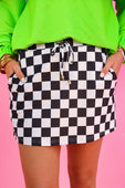 Black and white checkerboard checkered skort mini skirt with drawstring waistband perfect for casual wear