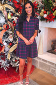 Evelyn dress navy plaid short sleeve dress with collar and magenta tie sleeve bow details at cuffs