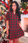 Evelyn dress in red plaid features short sleeves tied at cuffs v-neckline and a flared skirt with plaid print