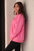 A vibrant pink extrovert mock neck pullover with oversized fit size and soft cotton blend featuring subtle front embroidery