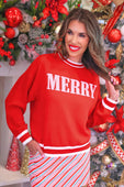Red merry jacquard knit sweater featuring white lettering and striped cuffs in a festive red jacquard knit design