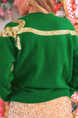 Green knit bow knit sweater with a gold sequin bow detail across the back in a sequin bow knit style