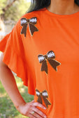 Sideline Sparkle Ruffle Top- Orange - Jess Lea Boutique