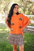 Sideline Sparkle Ruffle Top- Orange - Jess Lea Boutique
