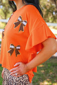 Sideline Sparkle Ruffle Top- Orange - Jess Lea Boutique