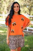 Sideline Sparkle Ruffle Top- Orange - Jess Lea Boutique