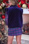Deep navy velvet quilted vest with ruffle shoulder details and a soft velvet finish for stylish layering
